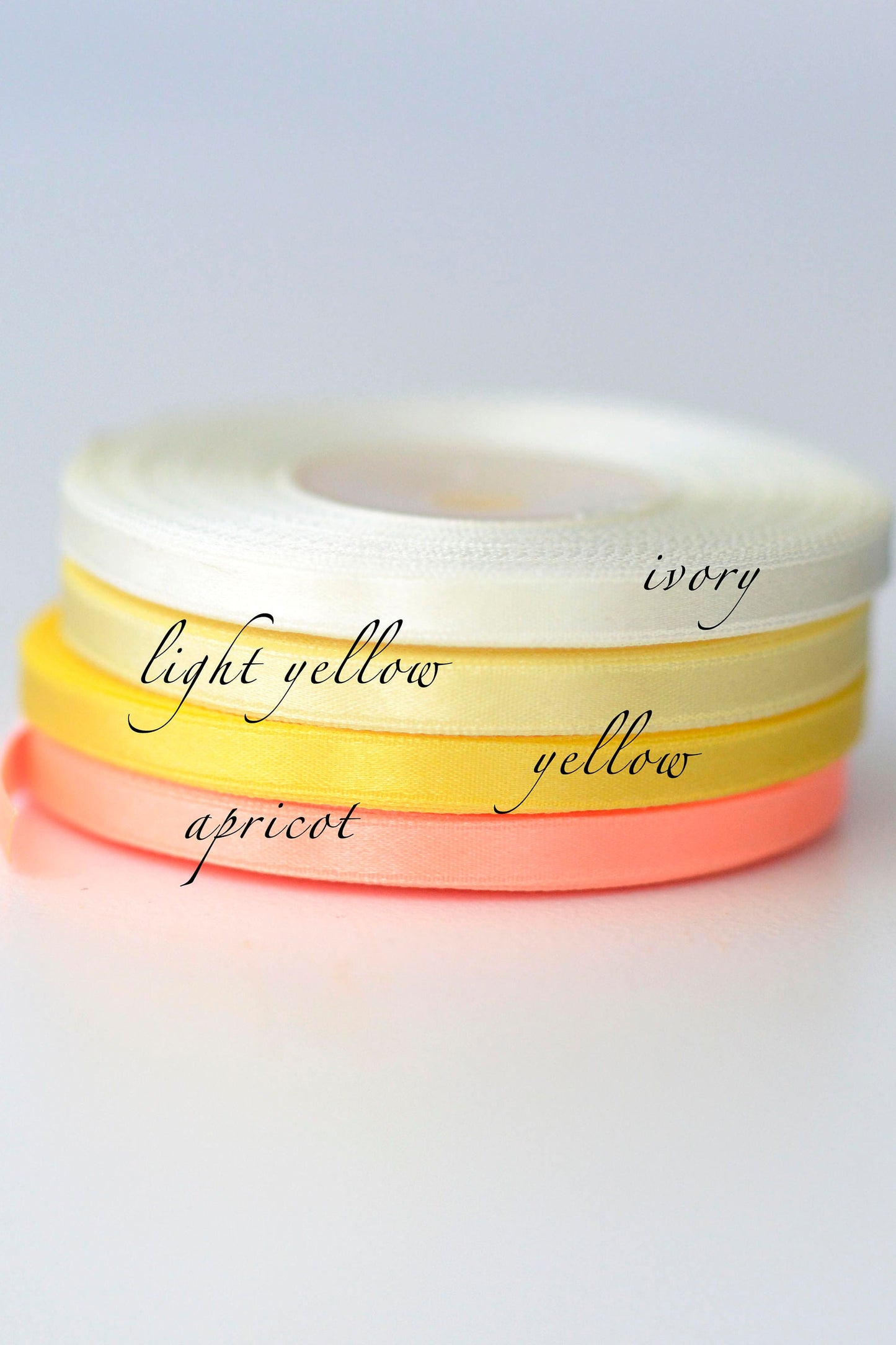 Yellow double sided satin ribbon roll