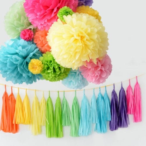 Rainbow party decor - paper flower pom poms and tassel garland