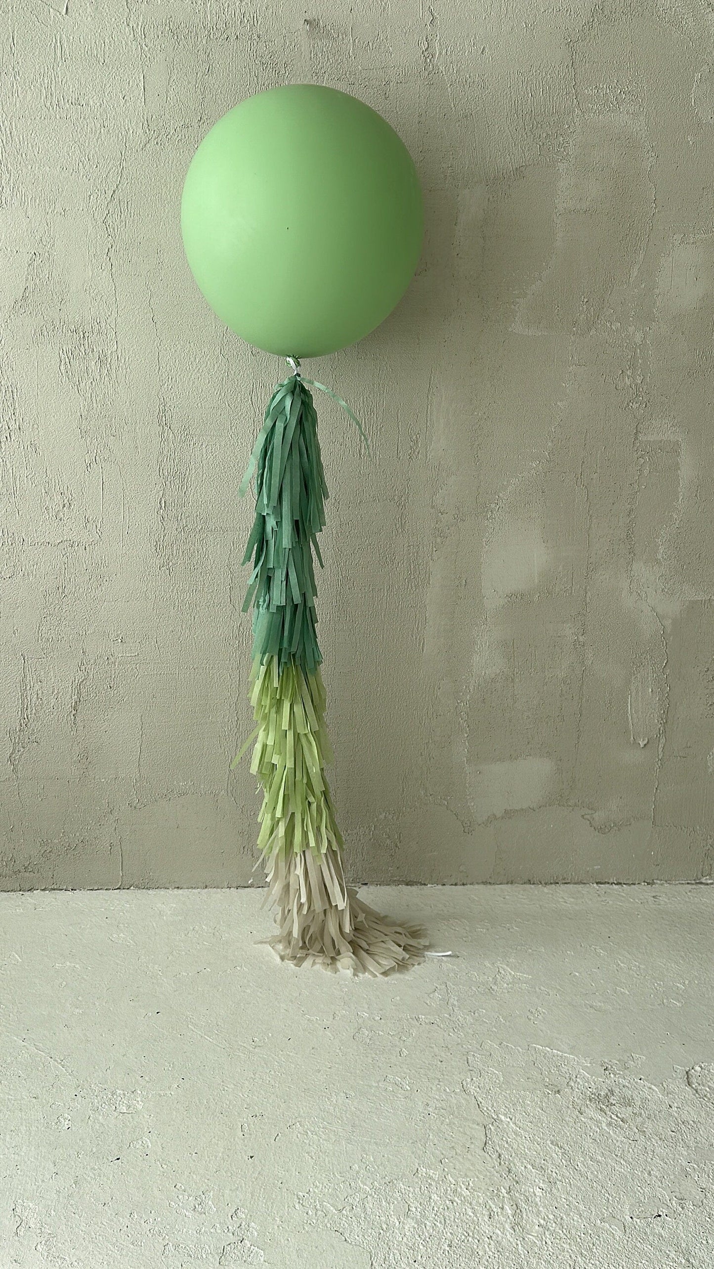 Sage green Giant balloon with green and cream paper fringe tail baby shower, wedding, birthday party balloon decorations paper tassel tail