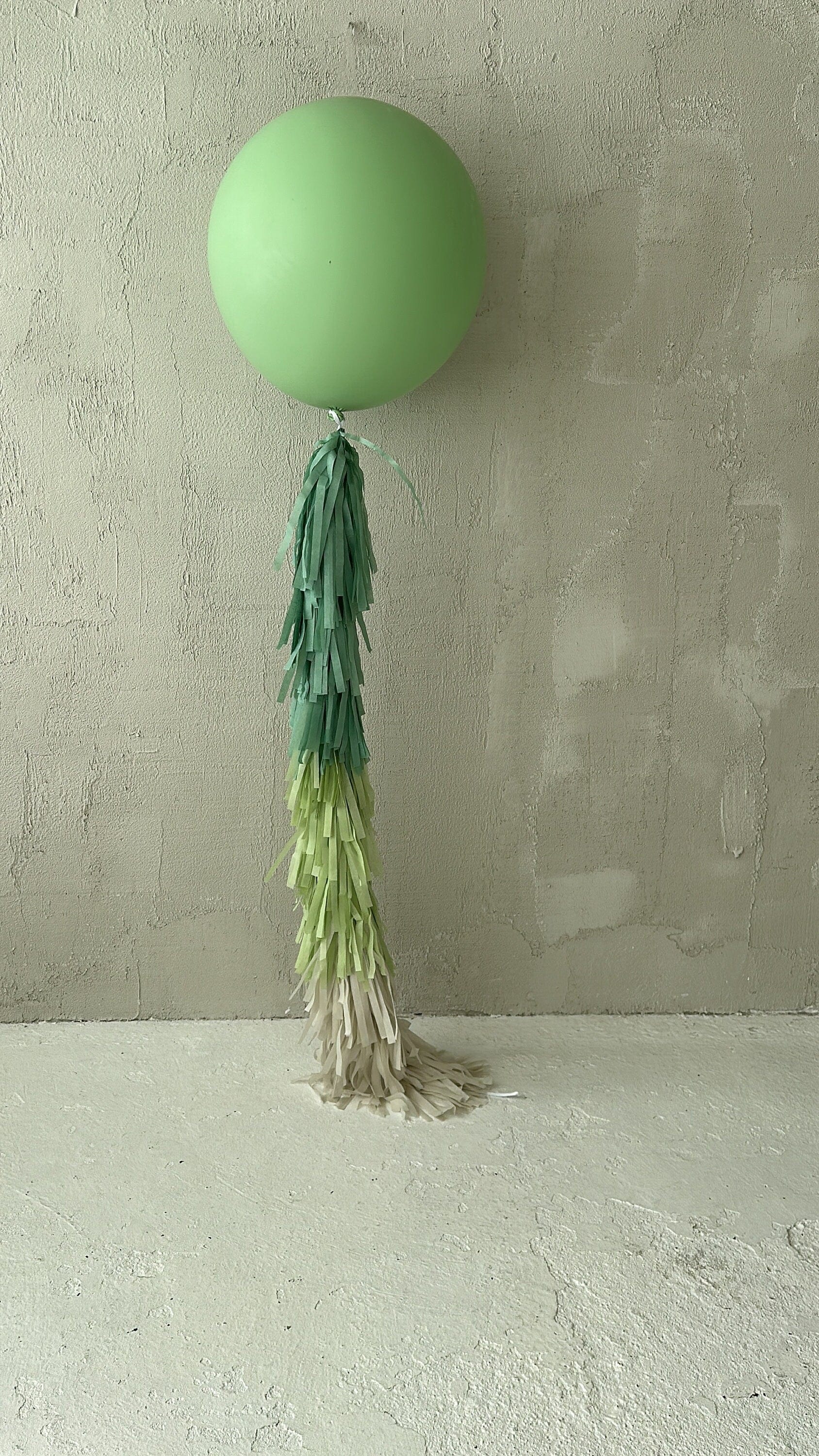 Sage green Giant balloon with green and cream paper fringe tail baby shower, wedding, birthday party balloon decorations paper tassel tail