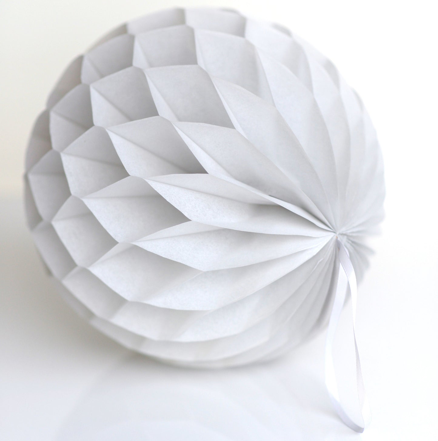 Grey tissue paper pom poms | Paper honeycomb balls | Winter party decor