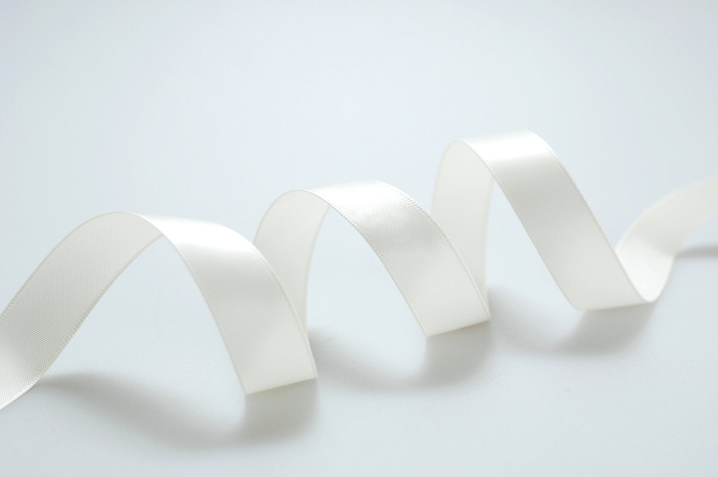 White double sided satin ribbon roll