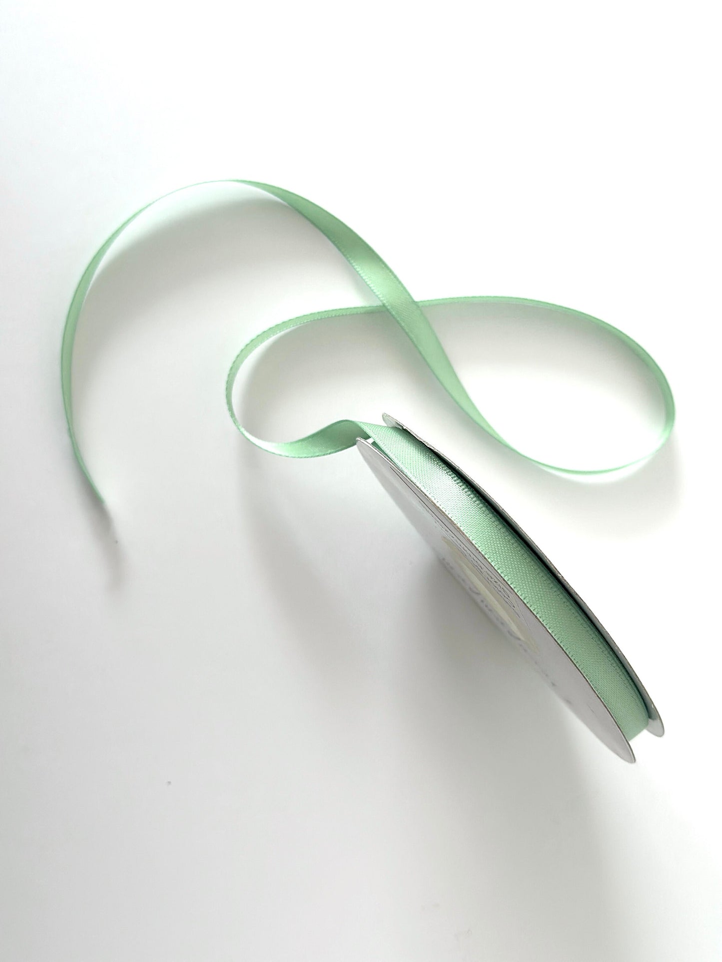 Sage green double sided satin ribbon roll
