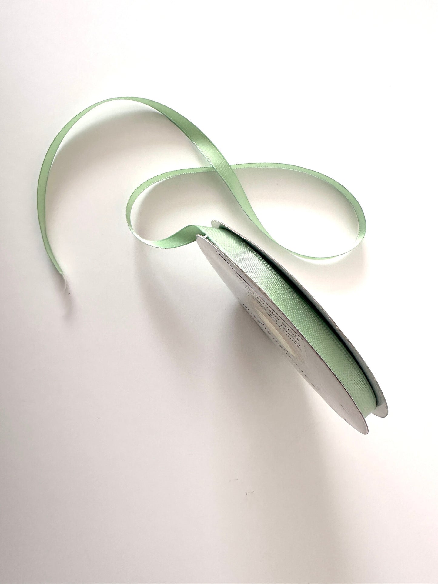 Sage green double sided satin ribbon roll