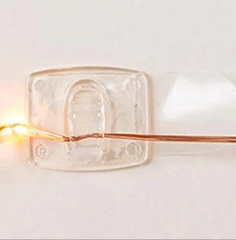 Removable , damage free  3m dorm light clips, clear, great for hanging string lights, pom poms, party decorations, strong and versatile