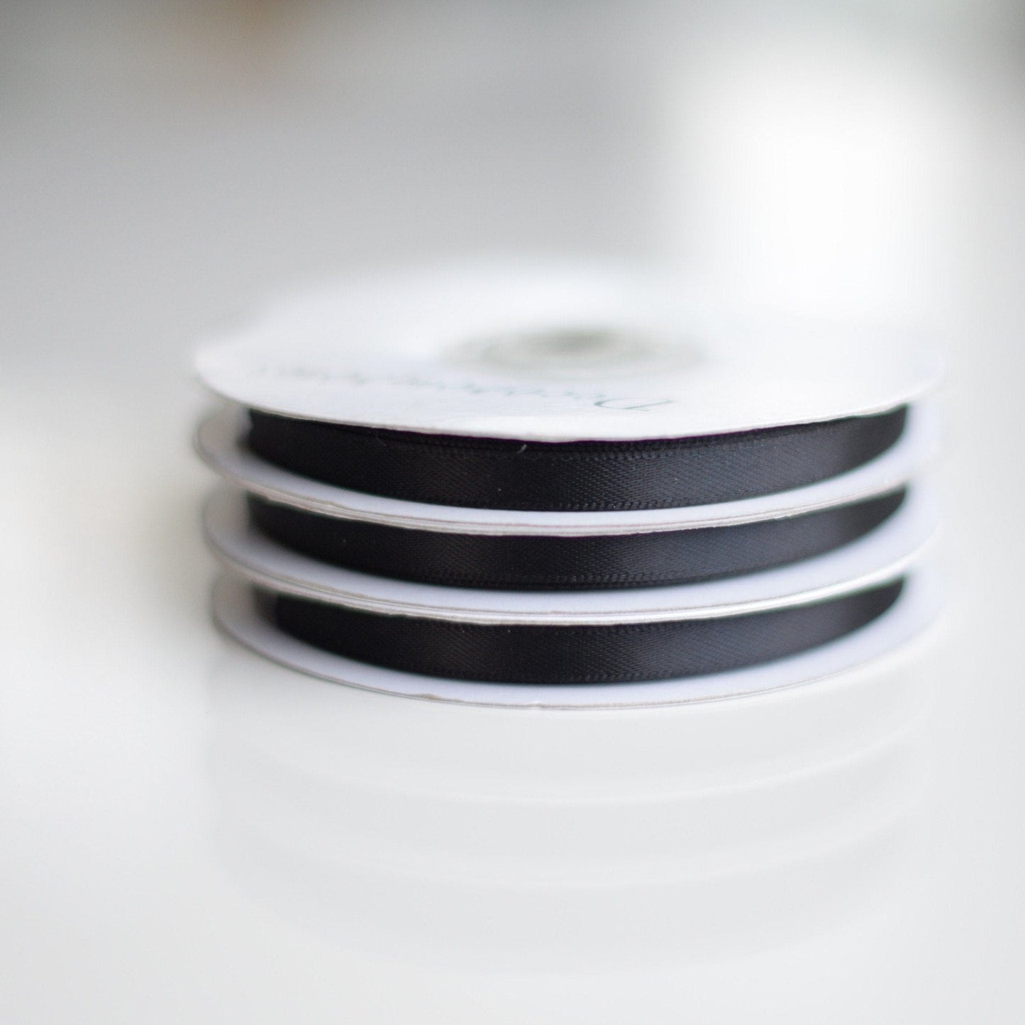 Black double sided satin ribbon roll - 25m - Decopompoms