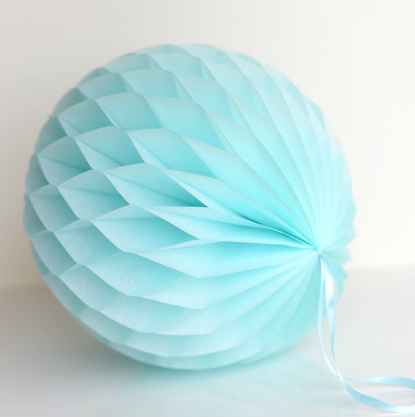 Light blue paper honeycomb - hanging party decorations - Decopompoms