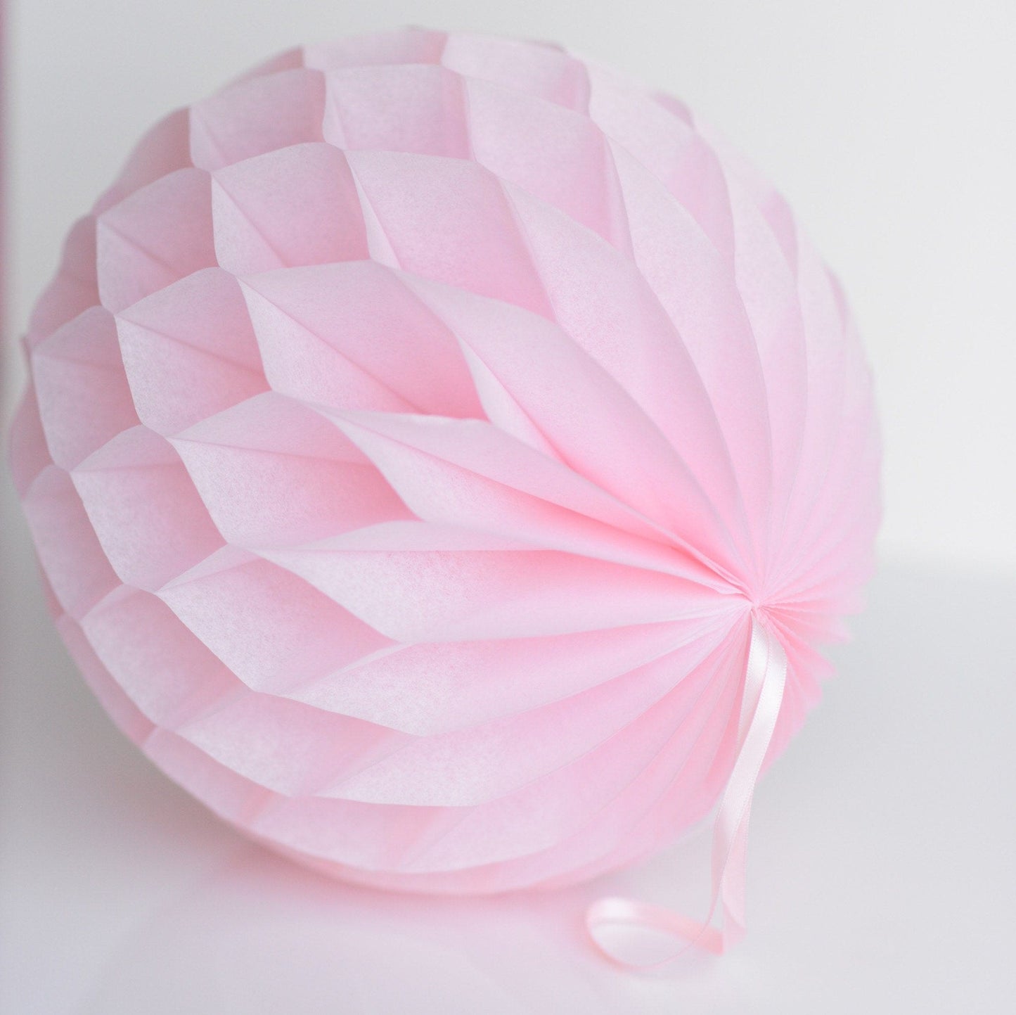 Light pink paper honeycomb - hanging party decorations - Decopompoms