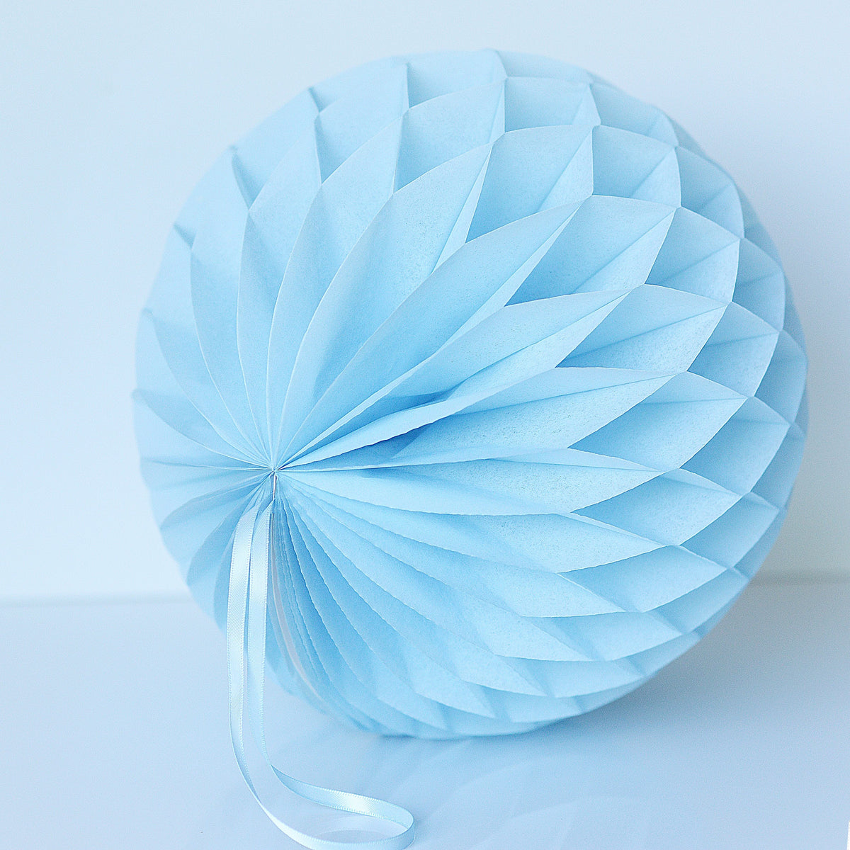 Powder blue paper honeycomb - hanging party decorations - Decopompoms